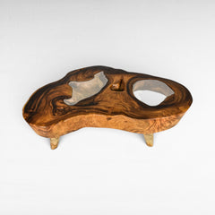 Chora Barefoot Luxury Living natural suar wood coffee table with clear resin inlays and unique live edge design.