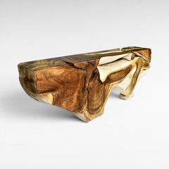 Chora Barefoot Luxury Living bleached and natural suar wood console table with organic, carved details.