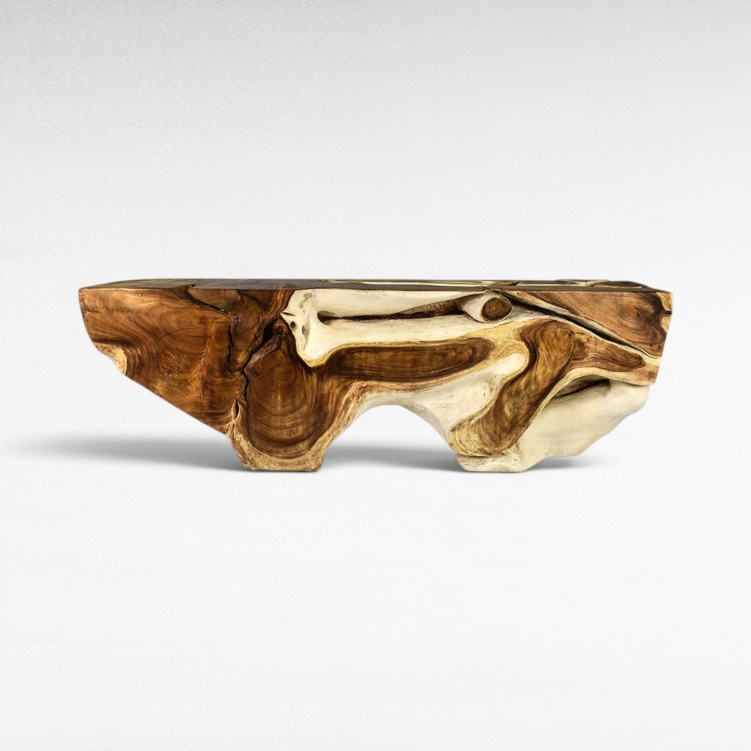 Chora Barefoot Luxury Living bleached and natural suar wood console table with organic, carved details.