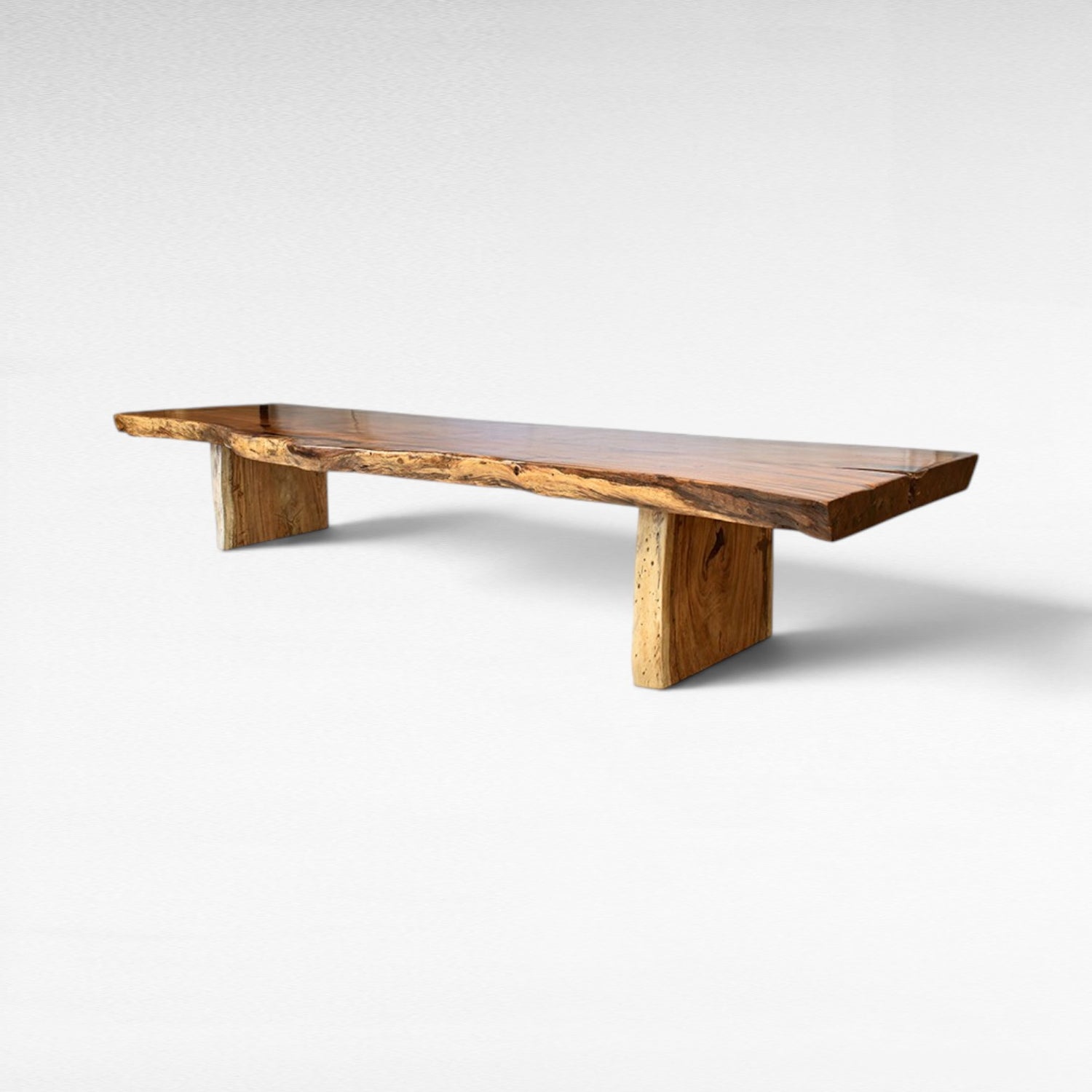 Chora Barefoot Luxury Living suar wood dining table with live edge and natural wood base. L510 x D110 x H80 cm.