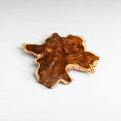 Chora Barefoot Luxury Living suar wood table top, star-shaped with natural live edge and intricate grain patterns.