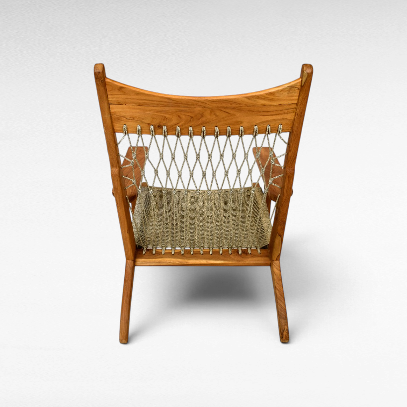 Chora Barefoot Luxury Living teak wood armchair with a woven synthetic raffia seat and decorative knotted back view.