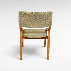 Chora Barefoot Luxury Living teak wood chair with woven synthetic rattan back and seat, back view.