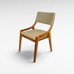 Chora Barefoot Luxury Living teak wood chair with woven synthetic rattan seat and backrest in a natural finish.