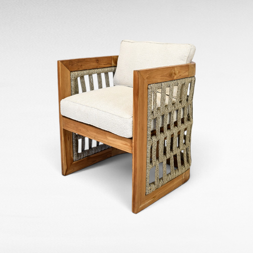 Chora Barefoot Luxury Living teak wood chair with woven rope sides and off-white upholstered seat and back cushions.