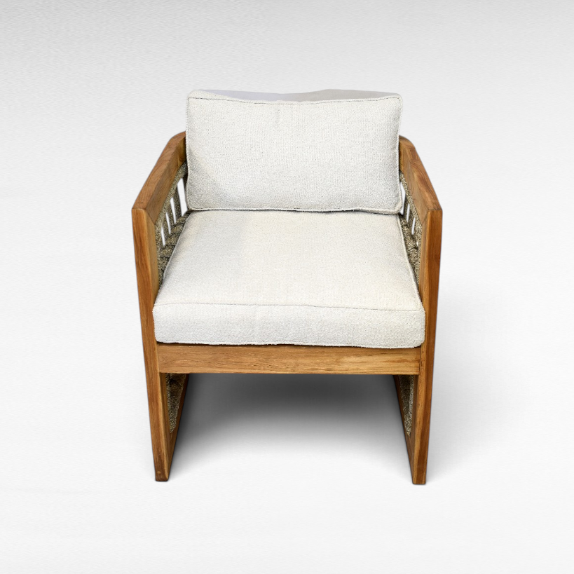 Chora Barefoot Luxury Living teak wood chair with natural rope sides and plush off-white cushioned seat and backrest.