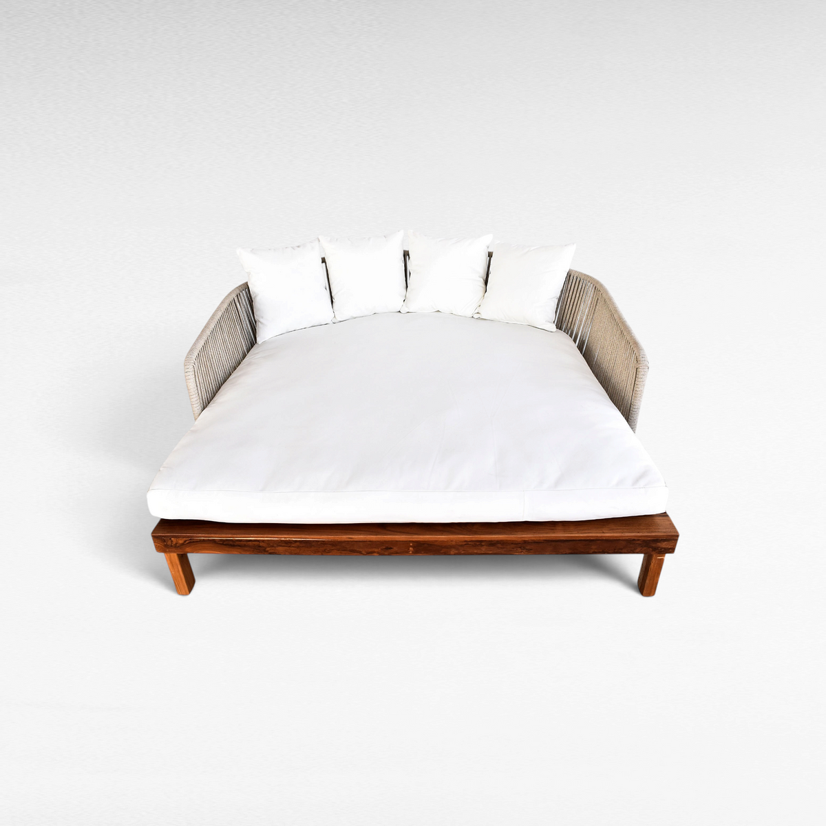 Chora Barefoot Luxury Living double outdoor lounger with teak wood base, woven rope sides, and white mattress cushions.