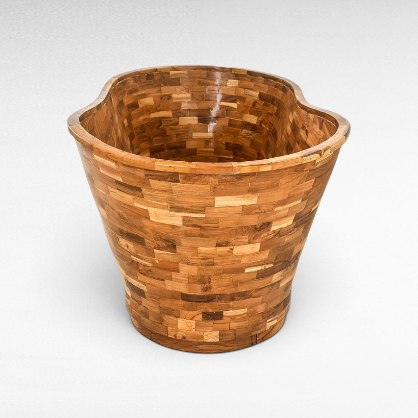 Chora Barefoot Luxury Living teak wood bathtub with a unique mosaic tile pattern and organic curved shape