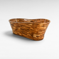 Chora Barefoot Luxury Living teak wood bathtub with a unique mosaic tile pattern and organic oval shape.