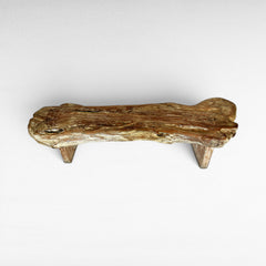 Chora Barefoot Luxury Living rustic teak wood bench with natural wood grain and distressed finish.