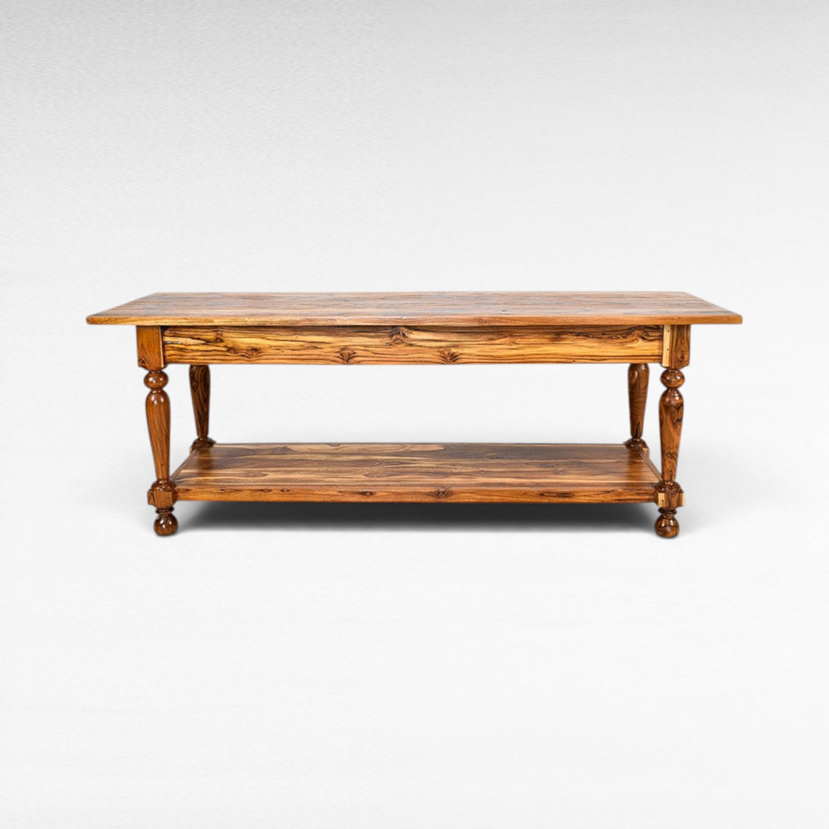 Chora Barefoot Luxury Living teak wood console table with drawer and lower shelf, featuring turned legs and natural wood grain.