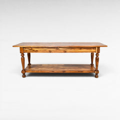 Chora Barefoot Luxury Living teak wood console table with drawer and lower shelf, featuring turned legs and natural wood grain.