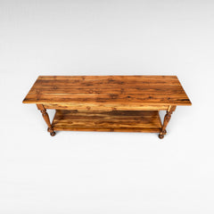 Chora Barefoot Luxury Living console table in teak wood with a lower shelf and turned legs.