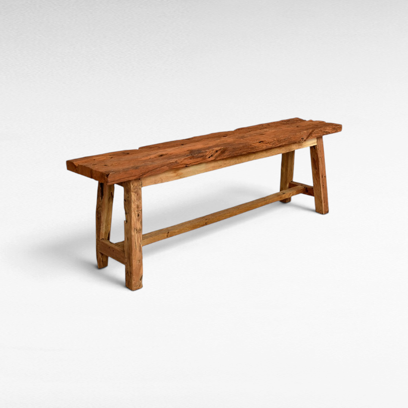 Chora Barefoot Luxury Living rustic bench handcrafted from solid teak wood with a distressed finish and organic grain.