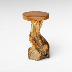 Chora Barefoot Luxury Living natural teak wood stool with a rustic organic tree root base and smooth circular top