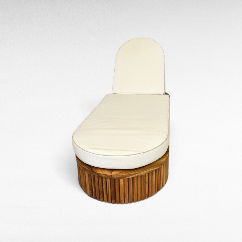 Chora Barefoot Luxury Living teak wood sunbed with a cream oval cushion for outdoor relaxation