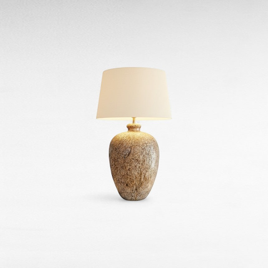 Chora Barefoot Luxury Living terracotta beige table lamp with textured base and cream shade, ideal for living rooms and bedrooms.