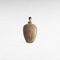 Chora Barefoot Luxury Living terracotta beige table lamp with textured ceramic base and brass fitting.
