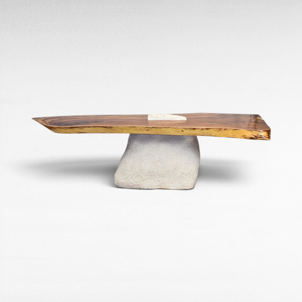 Chora Barefoot Luxury Living terrazzo and suar wood dining table with a unique stone base. Natural wood grain.