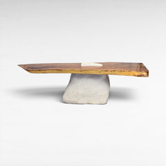 Chora Barefoot Luxury Living terrazzo and suar wood dining table with a unique stone base. Natural wood grain.