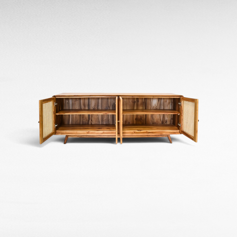 Chora Barefoot Luxury Living Viennesse rattan buffet cabinet with open doors showing internal wooden shelving.