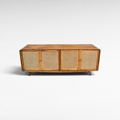 Chora Barefoot Luxury Living Viennesse rattan buffet cabinet with four doors and natural wood finish.