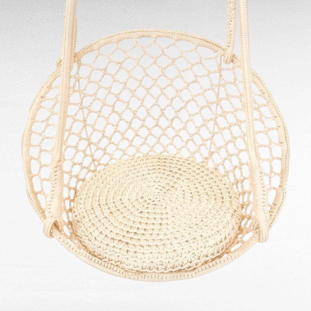 Chora Barefoot Luxury Living white macrame rope hammock swing with a circular woven seat pad for indoor relaxation