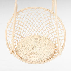 Chora Barefoot Luxury Living white macrame rope hammock swing with a circular woven seat pad for indoor relaxation