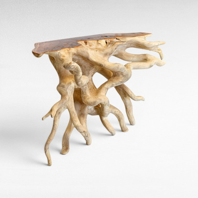 Chora Barefoot Luxury Living natural wood console table with a live edge top and intricate root base.