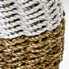 Chora Barefoot Luxury Living stool featuring a detailed close-up of woven natural grass and white rope texture.