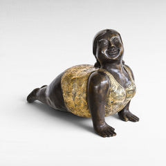 Chora Barefoot Luxury Living bronze and gold yoga figurine in a playful pose, detailed with floral patterns.