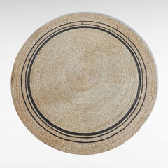Chora Barefoot Luxury Living natural and black synthetic rattan round carpet, 200x200cm, with concentric circle design.