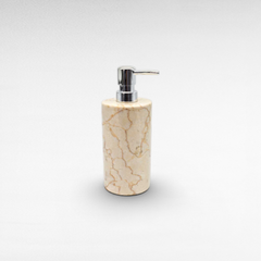Chora Barefoot Luxury Living beige marble soap dispenser with chrome pump. Elegant and durable bathroom accessory.