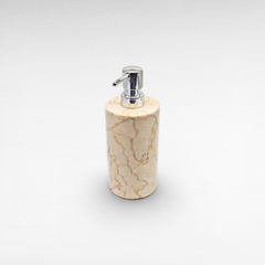Chora Barefoot Luxury Living beige marble soap dispenser with chrome pump. Cylindrical design.