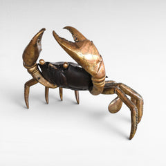 Chora Barefoot Luxury Living oversized bronze crab sculpture with polished brass claws and legs, black and gold finish.