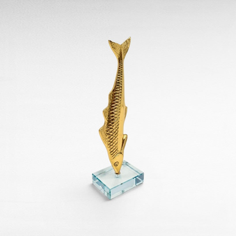 Chora Barefoot Luxury Living decorative bronze gold fish sculpture on clear acrylic base.