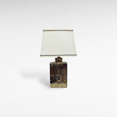 Chora Barefoot Luxury Living gold and black tiger table lamp with a cream lampshade.