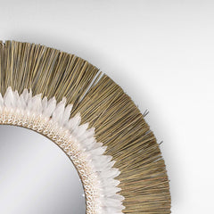 Chora Barefoot Luxury Living 100cm round mirror with natural grass and white feather frame. Statement wall decor.