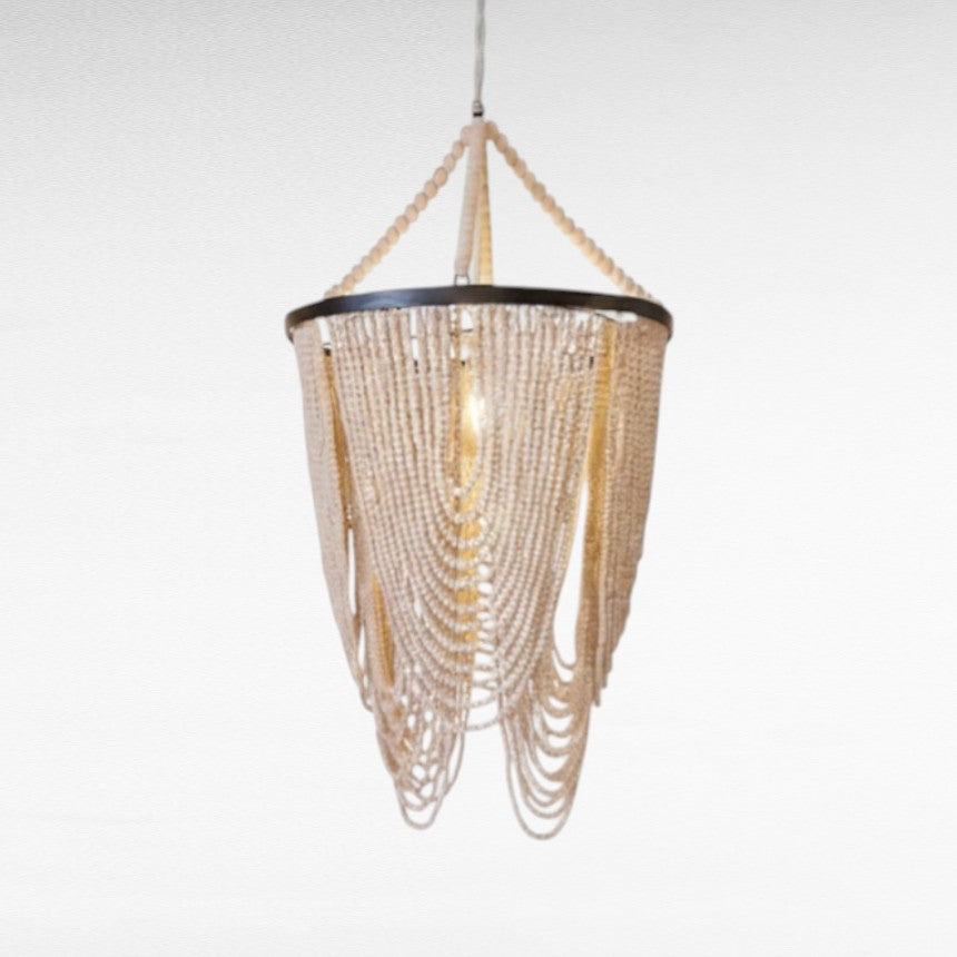 Chora Barefoot Luxury Living Ivory Cascade beaded chandelier with looped wooden beads and dark metal frame.