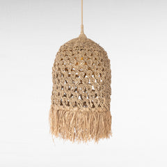 Chora Barefoot Luxury Living natural woven rattan and grass pendant light with fringe detail