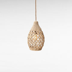 Chora Barefoot Luxury Living off-white handwoven rope pendant light in a drop shape, 38cm high.