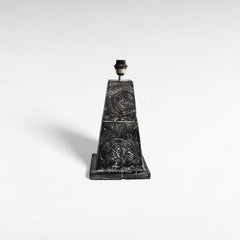 Chora Barefoot Luxury Living teak wood table lamp with a trapezoidal base and distressed black finish, showcasing wood grain patterns.