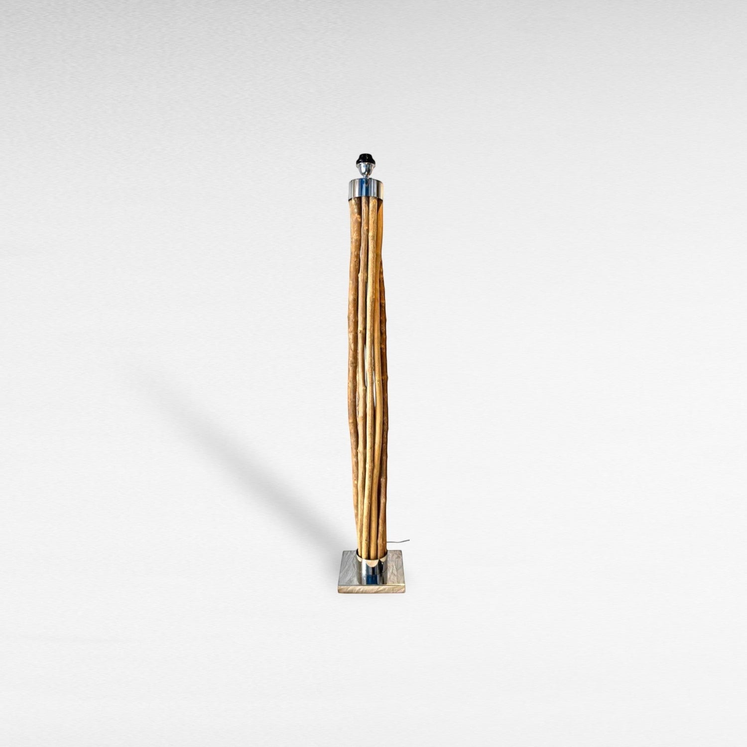 Chora Barefoot Luxury Living natural wood floor lamp with stainless steel accents and a woven raffia shade, 150cm height.