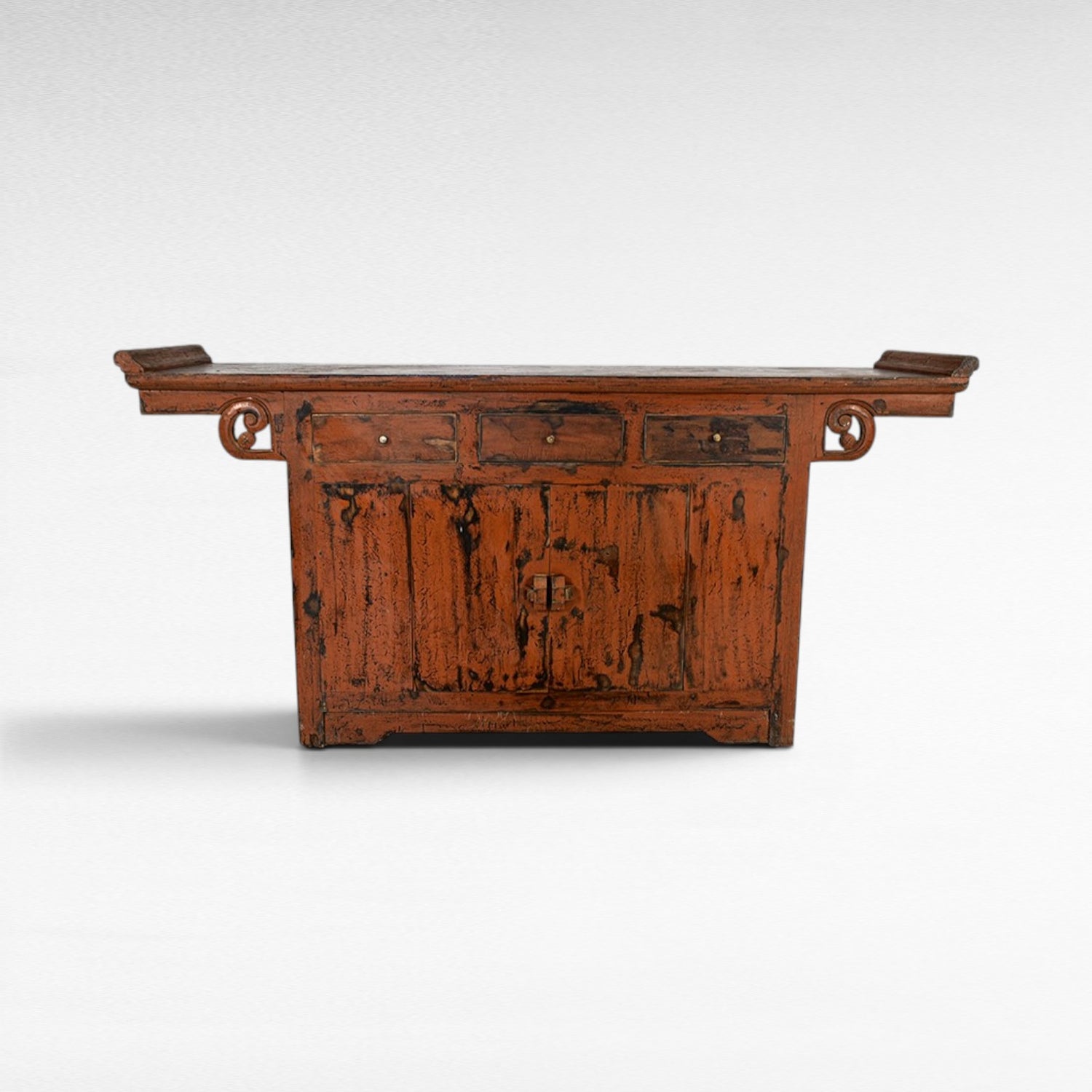 Chora Barefoot Luxury Living antique red distressed wood buffet with three drawers and double doors, ornate carved details.